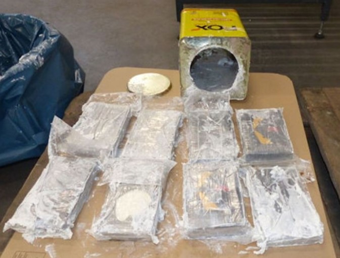 Illegal Turn Produces 8½ Pounds Of Coke, 150 Pounds Of Pot, Loaded Guns, $50K, Three Arrests In